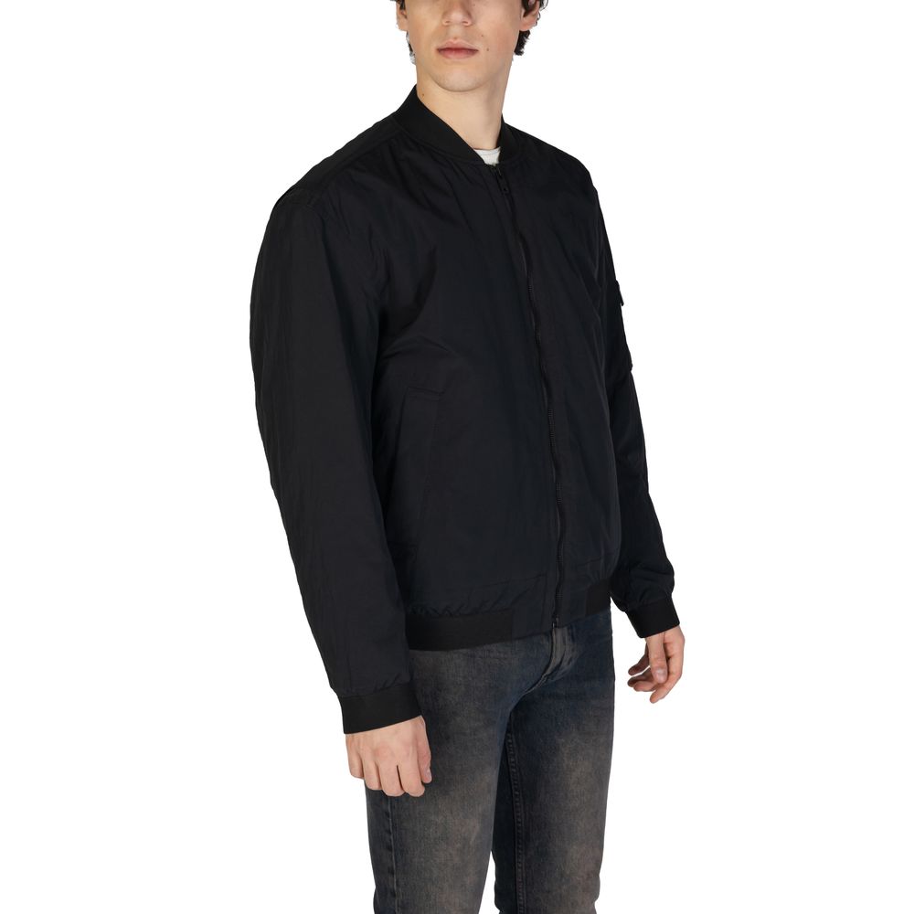 black technical bomber jacket side view