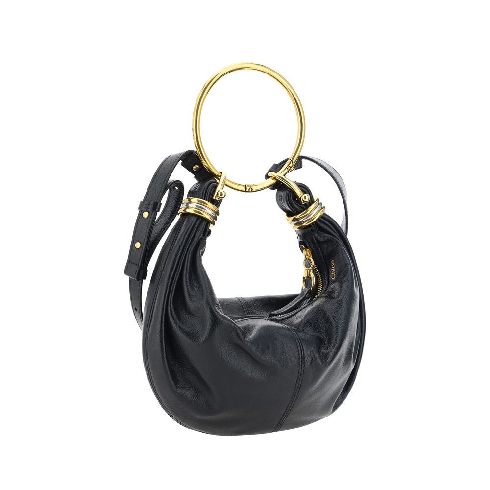 Front view of black calf leather bracelet handle handbag by KILAUE
