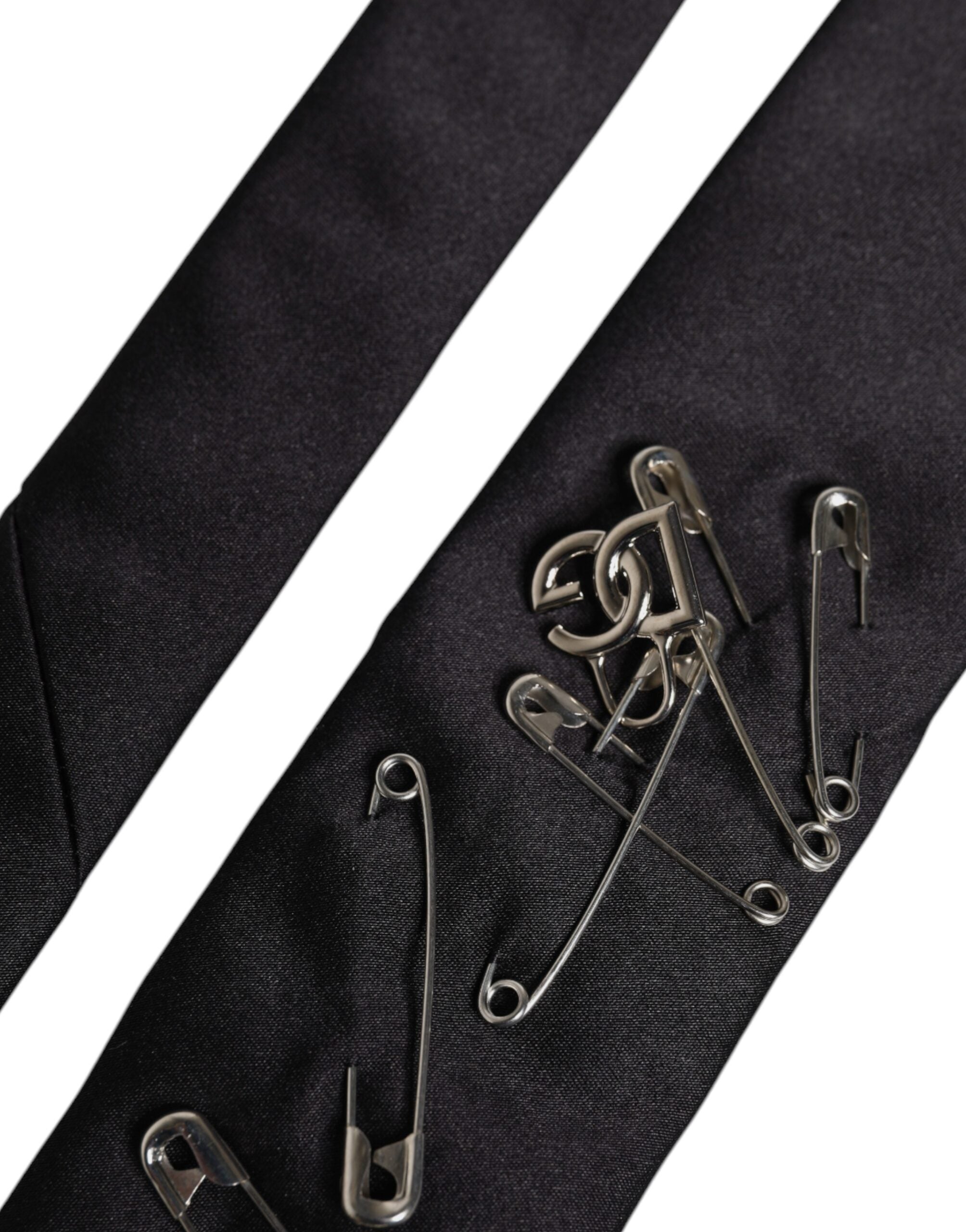 Stylish black silk tie with safety-pin detail