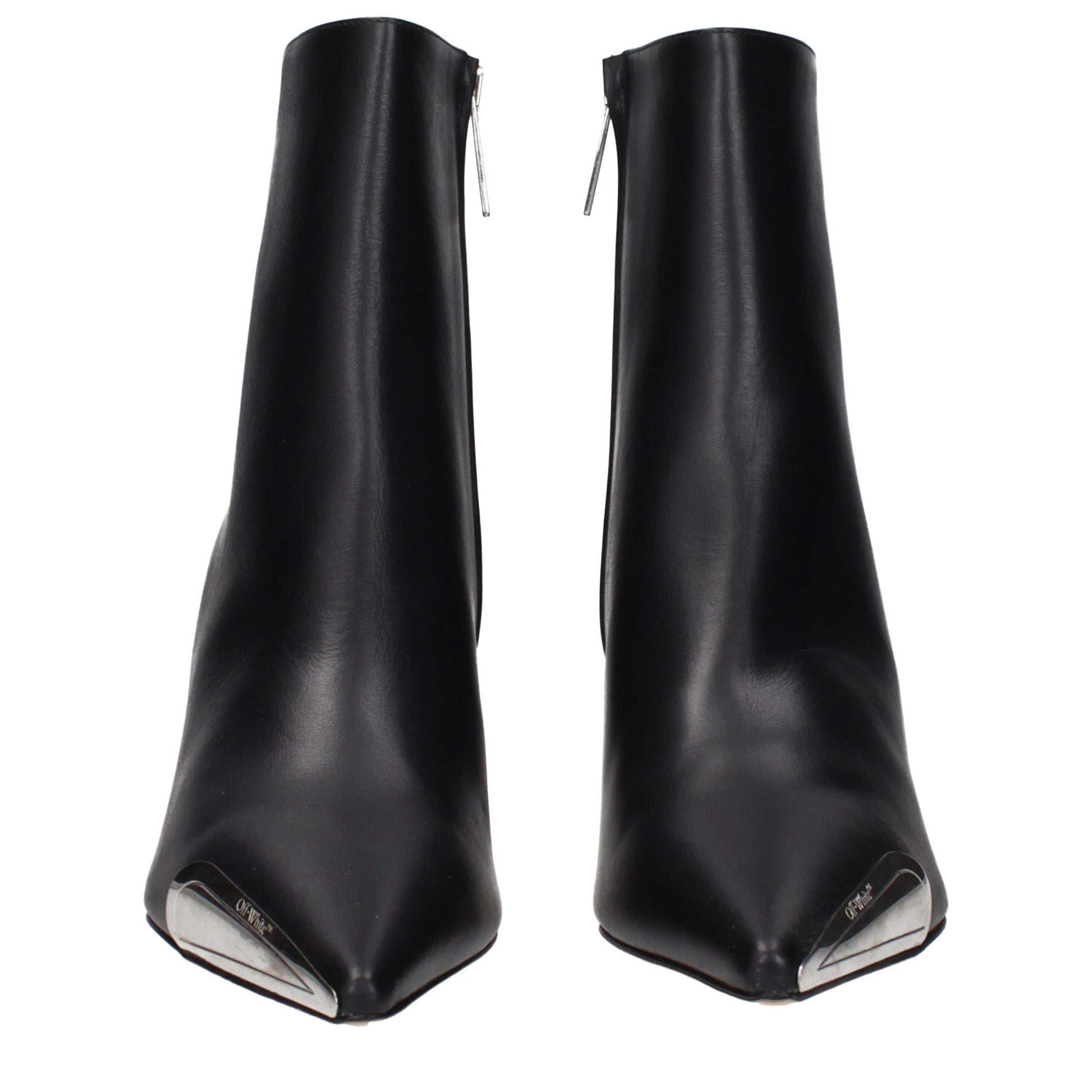 close‑up‑detail‑of‑black‑leather‑ankle‑boots