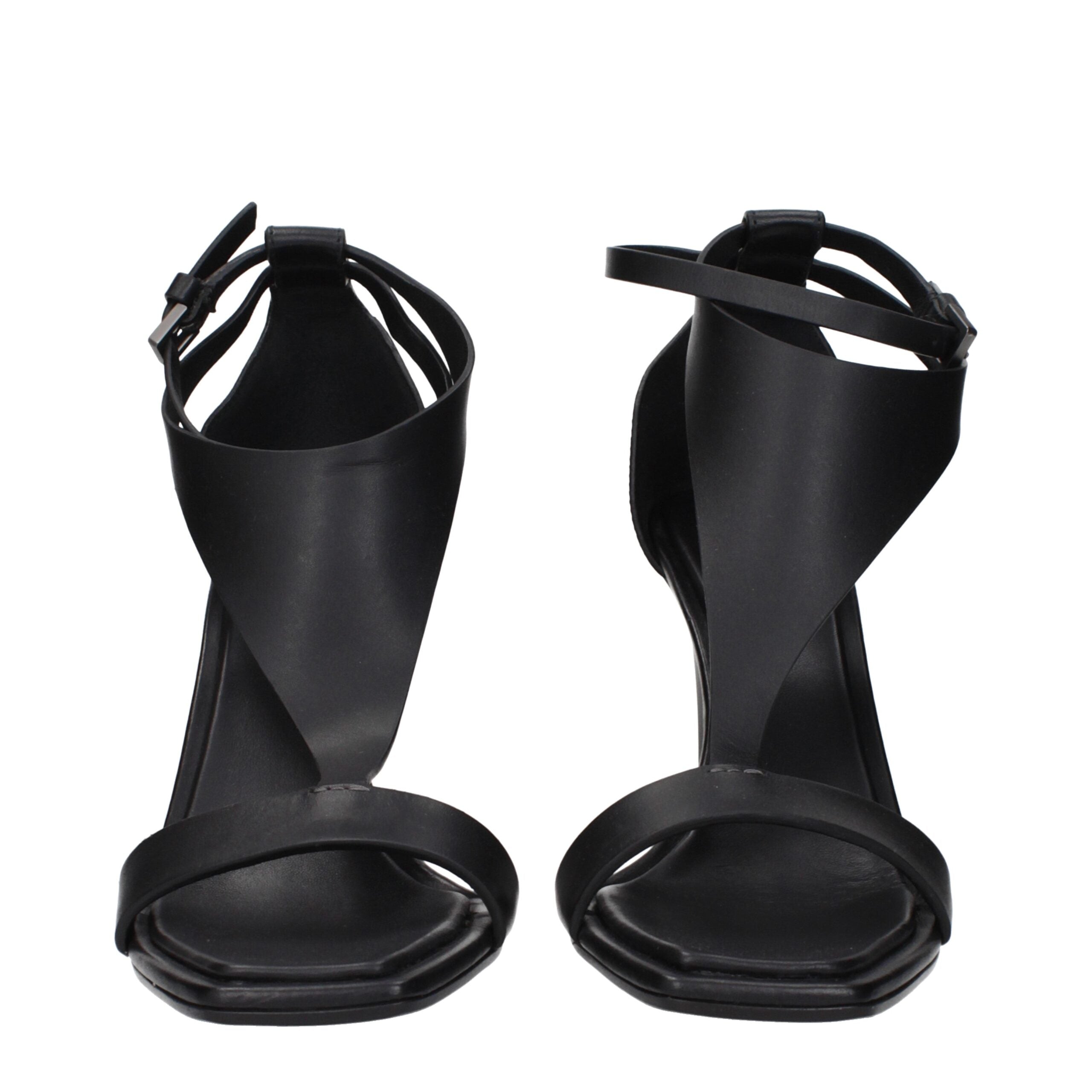close‑up‑detail‑of‑black‑leather‑stiletto‑heel‑sandals