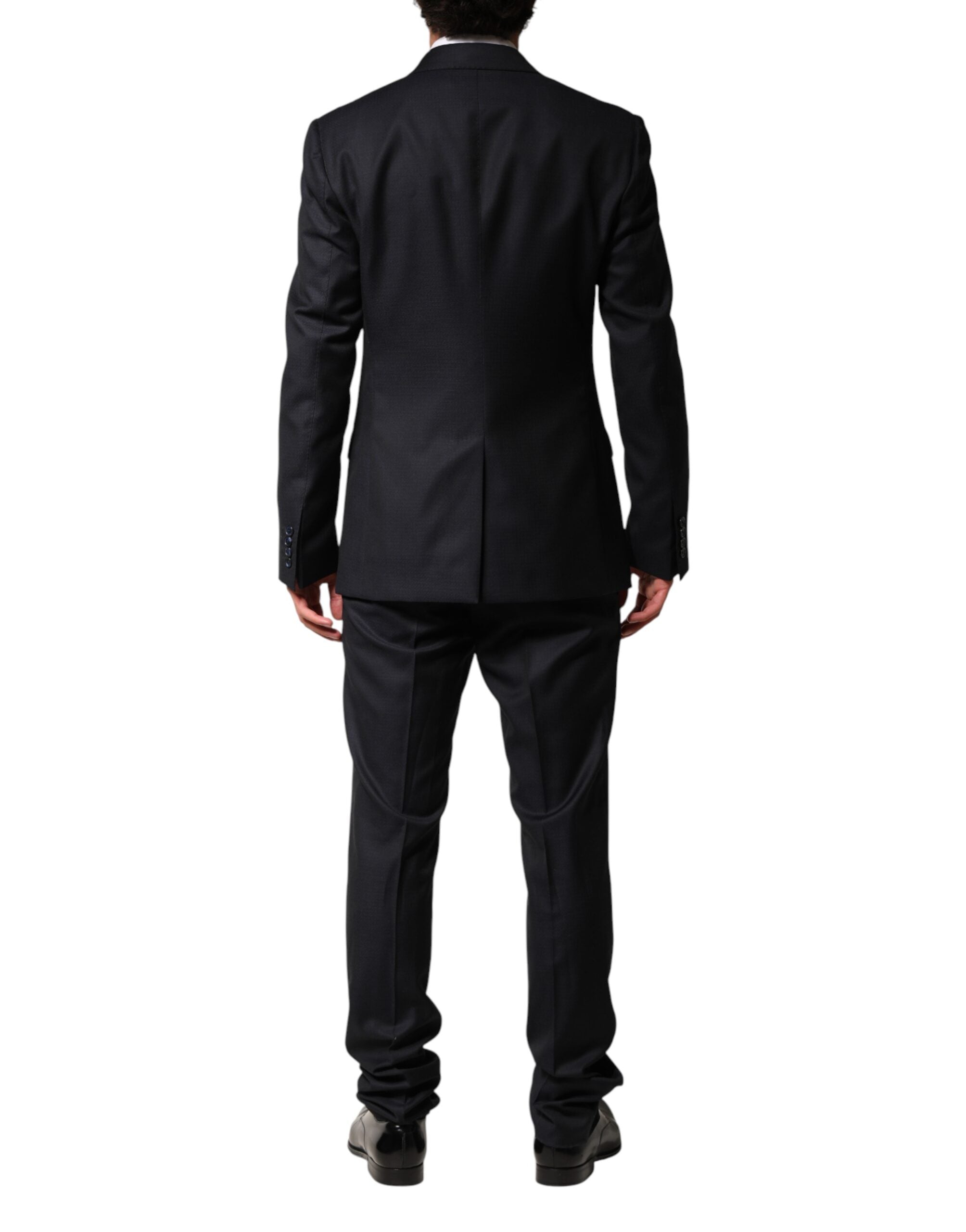 Classic men’s black formal wool suit on mannequin