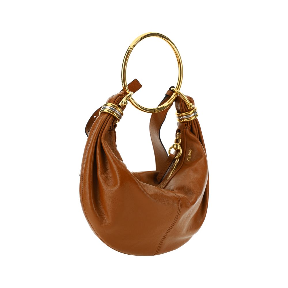 Brown calf leather Bos Taurus handbag by KILAUE
