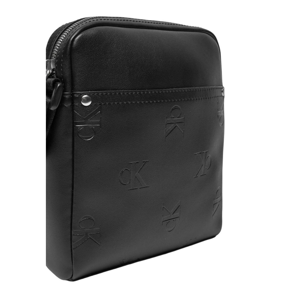 Calvin Klein AOP reporter bag crossbody side view