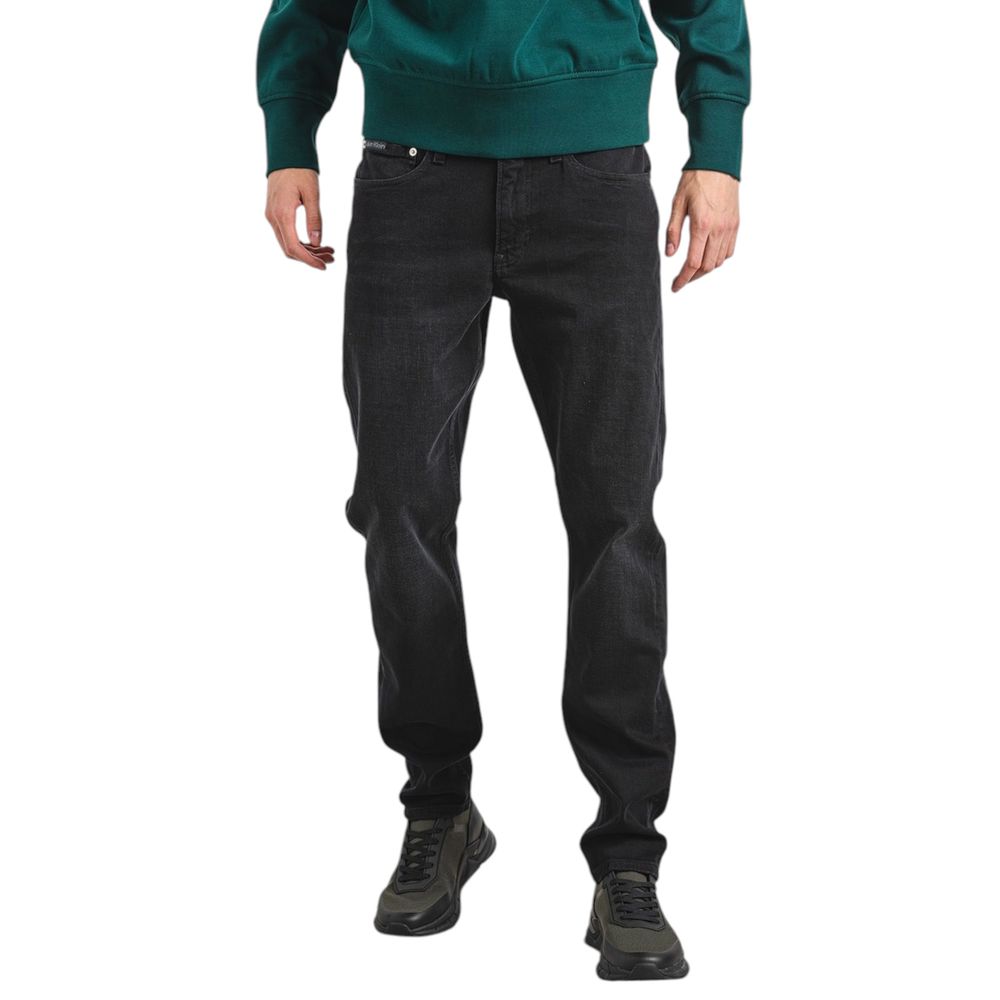 Calvin Klein black slim taper jeans men front view
