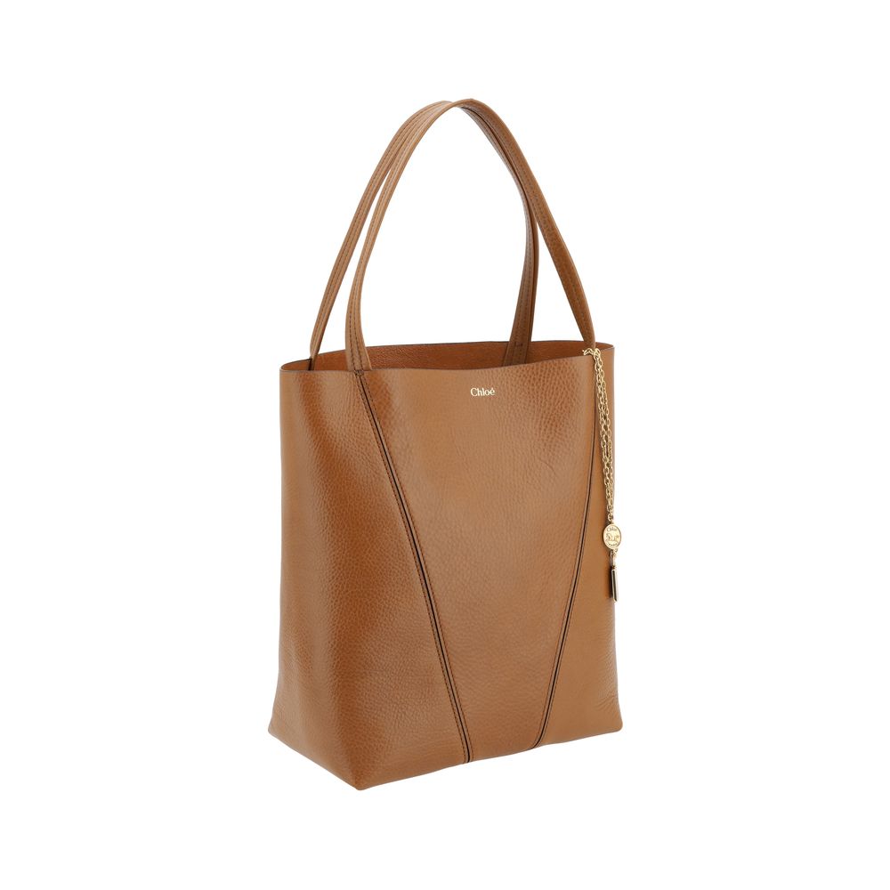 Side view of Chlo brown Spin calf leather hobo shoulder bag