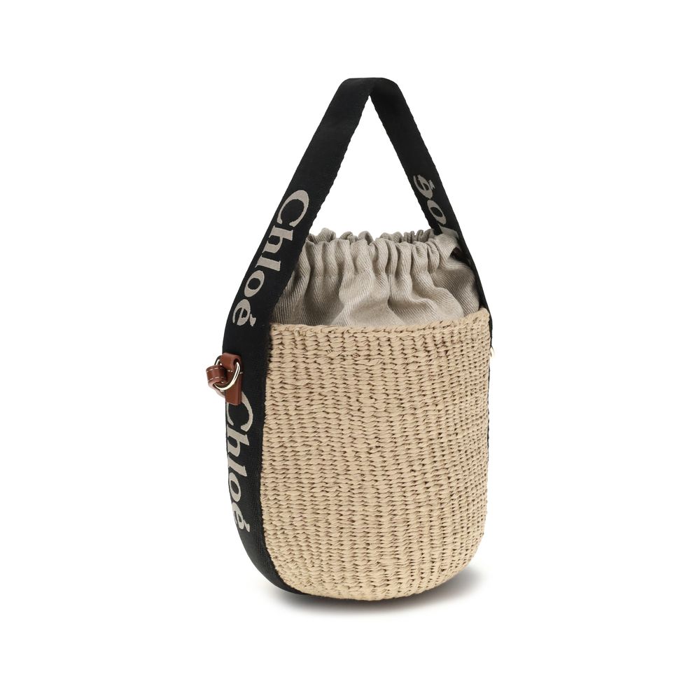 Side view of Chlo Woody mini bucket bag in beige and azul – ethical designer bag KILAUE