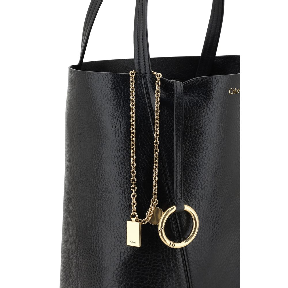 Chloé black grained calf leather Spin shoulder bag styled outfit