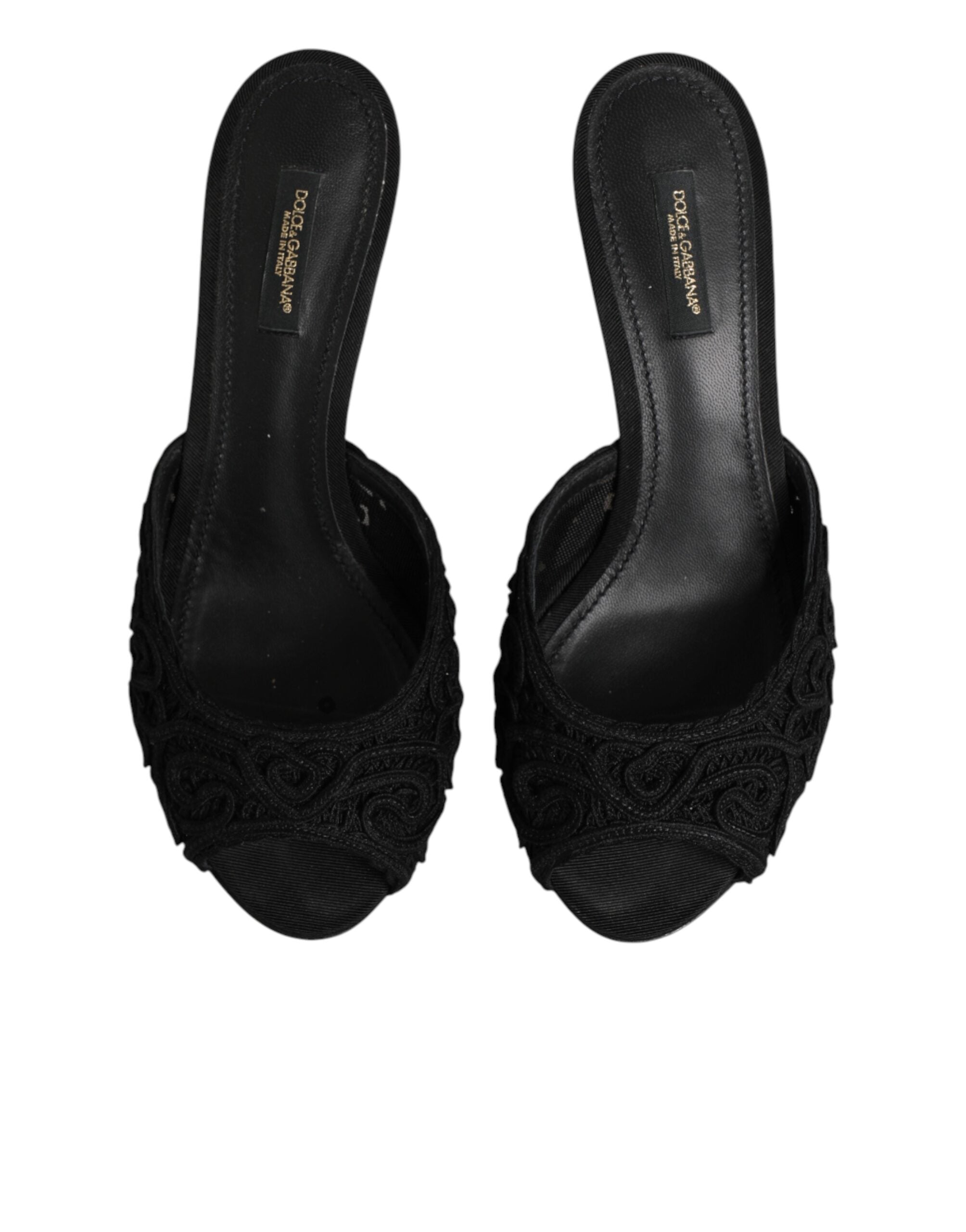 Front view of Dolce & Gabbana black embroidered slip‑on heels artisan slides by KILAUE
