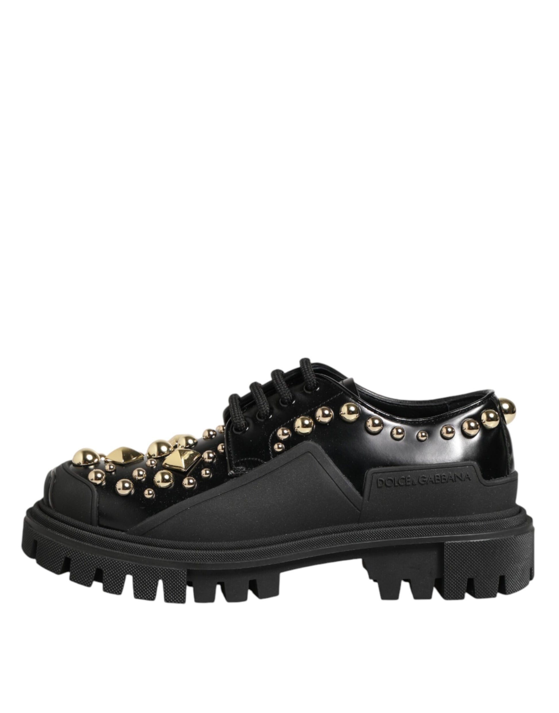 Model wearing Dolce & Gabbana black leather jeweled crystal derby shoes by KILAUE
