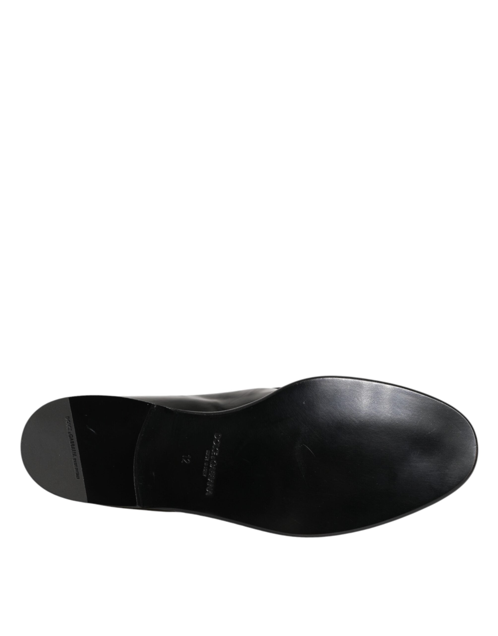 Close-up detail of Dolce & Gabbana black polished leather dress loafers by KILAUE
