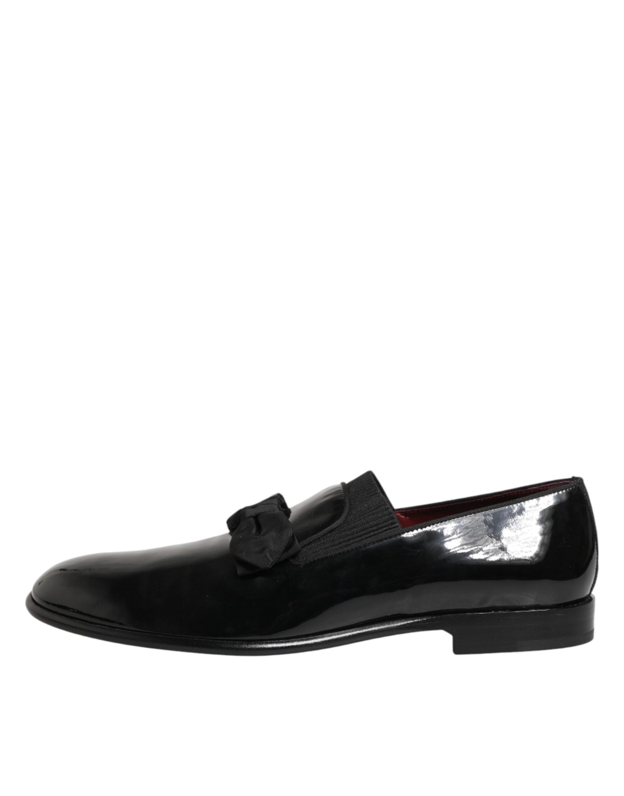 Model wearing Dolce & Gabbana black polished leather dress loafers by KILAUE
