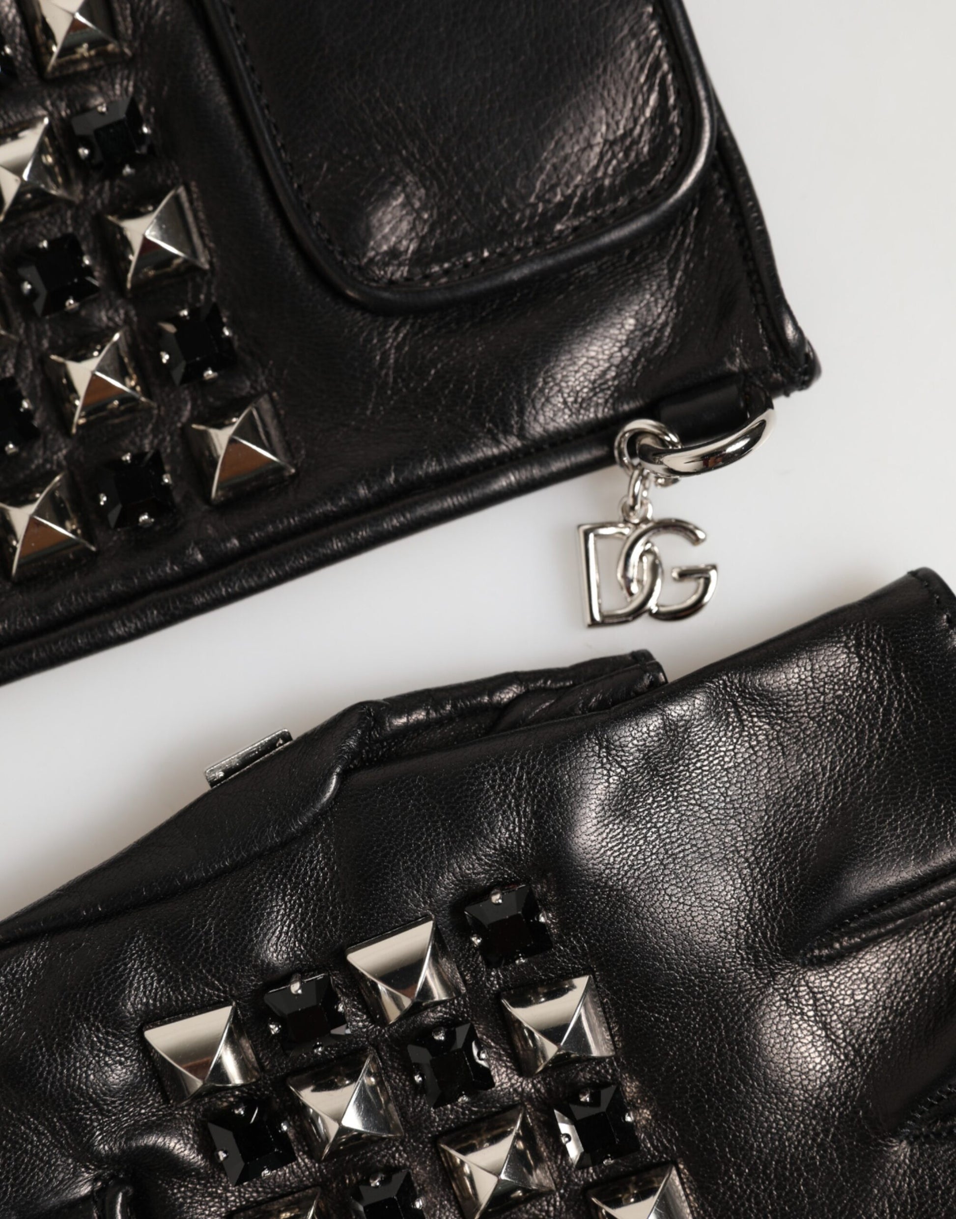 Back view of Dolce & Gabbana black studded leather fingerless gloves by KILAUE
