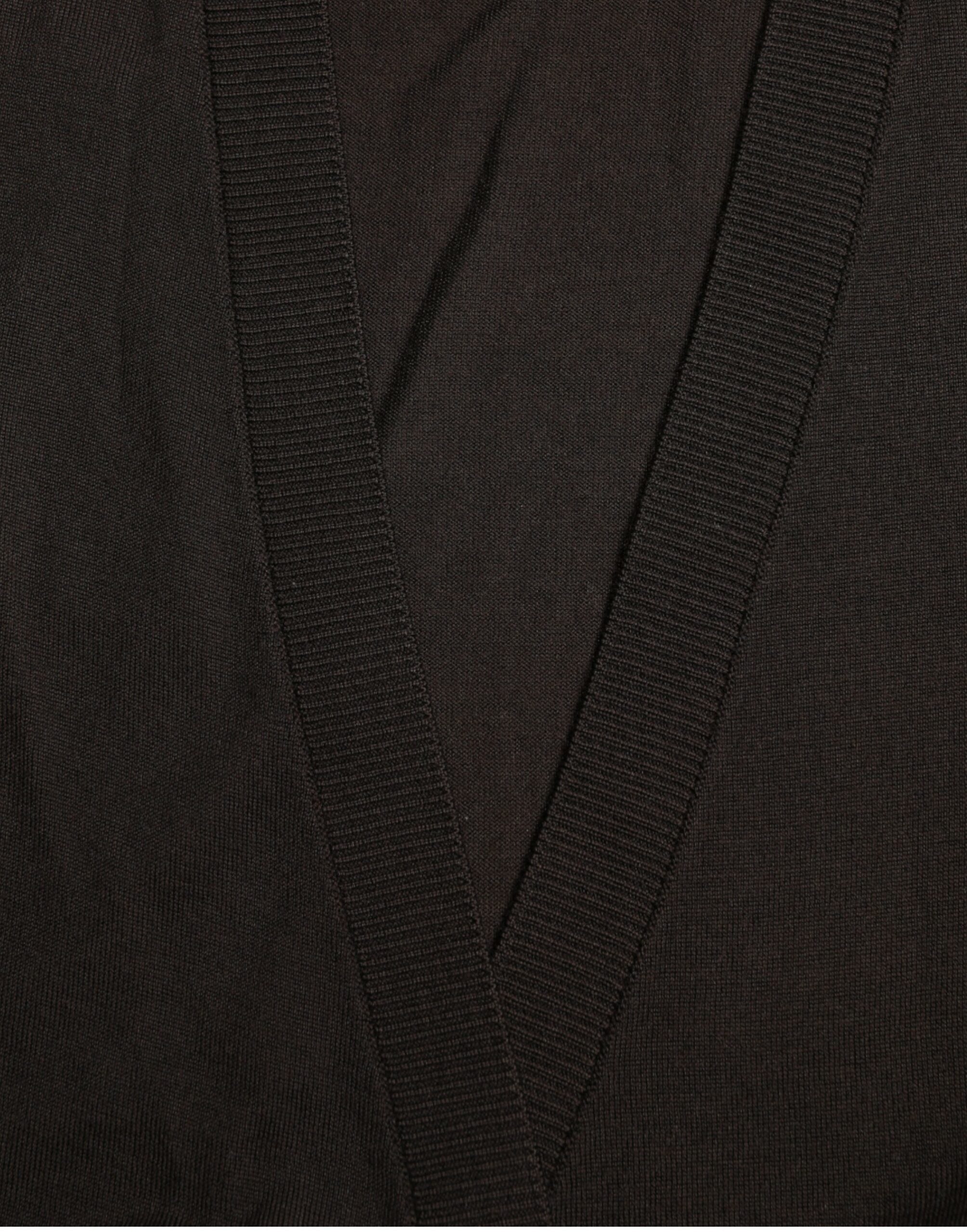 Side view of Dolce & Gabbana black virgin wool V‑neck