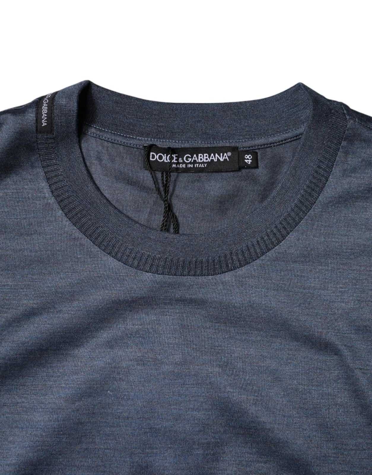 Model wearing Dolce & Gabbana blue 100% silk crew neck T-shirt by KILAUE
