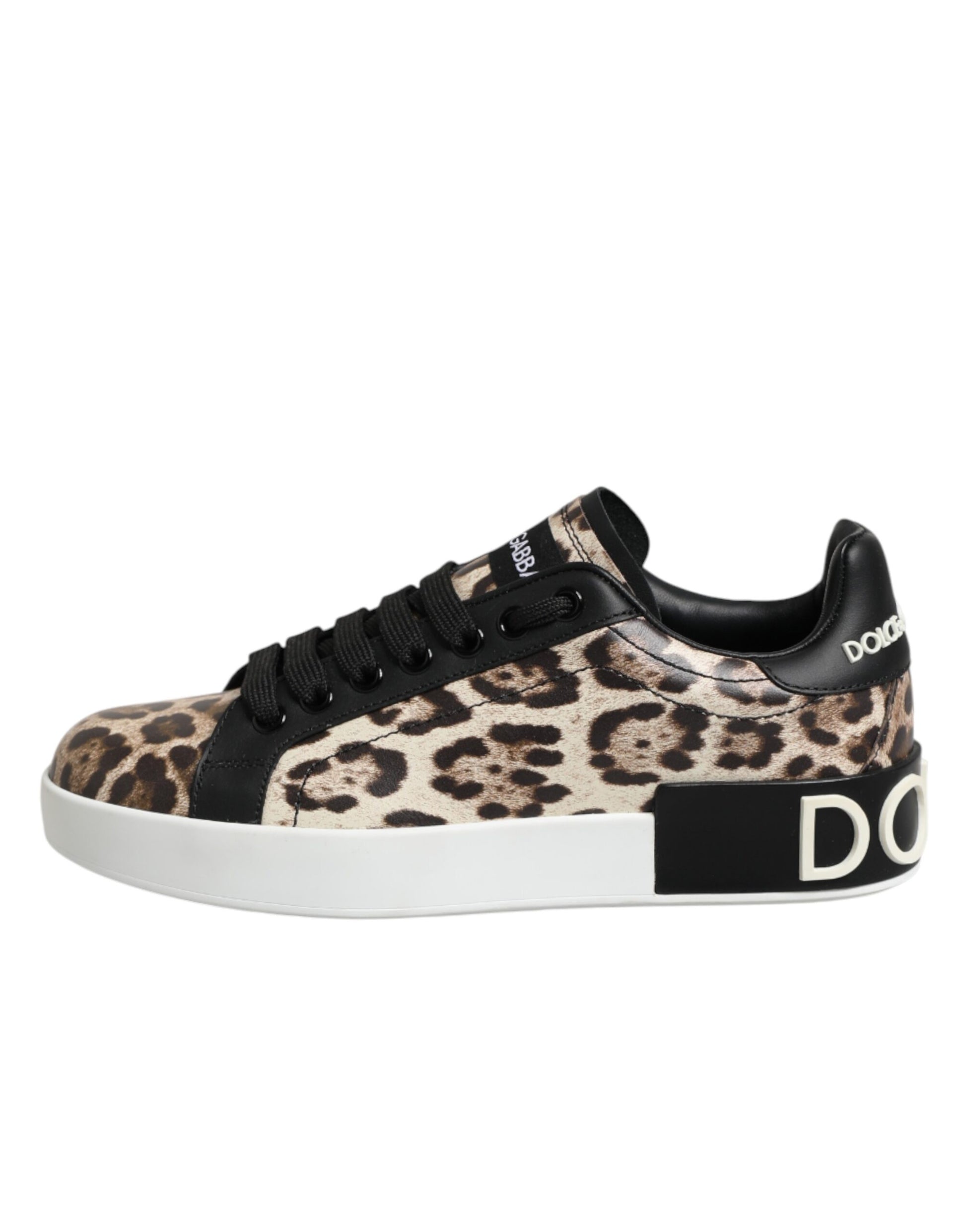 Model wearing Dolce & Gabbana brown leather leopard low-top sneakers by KILAUE
