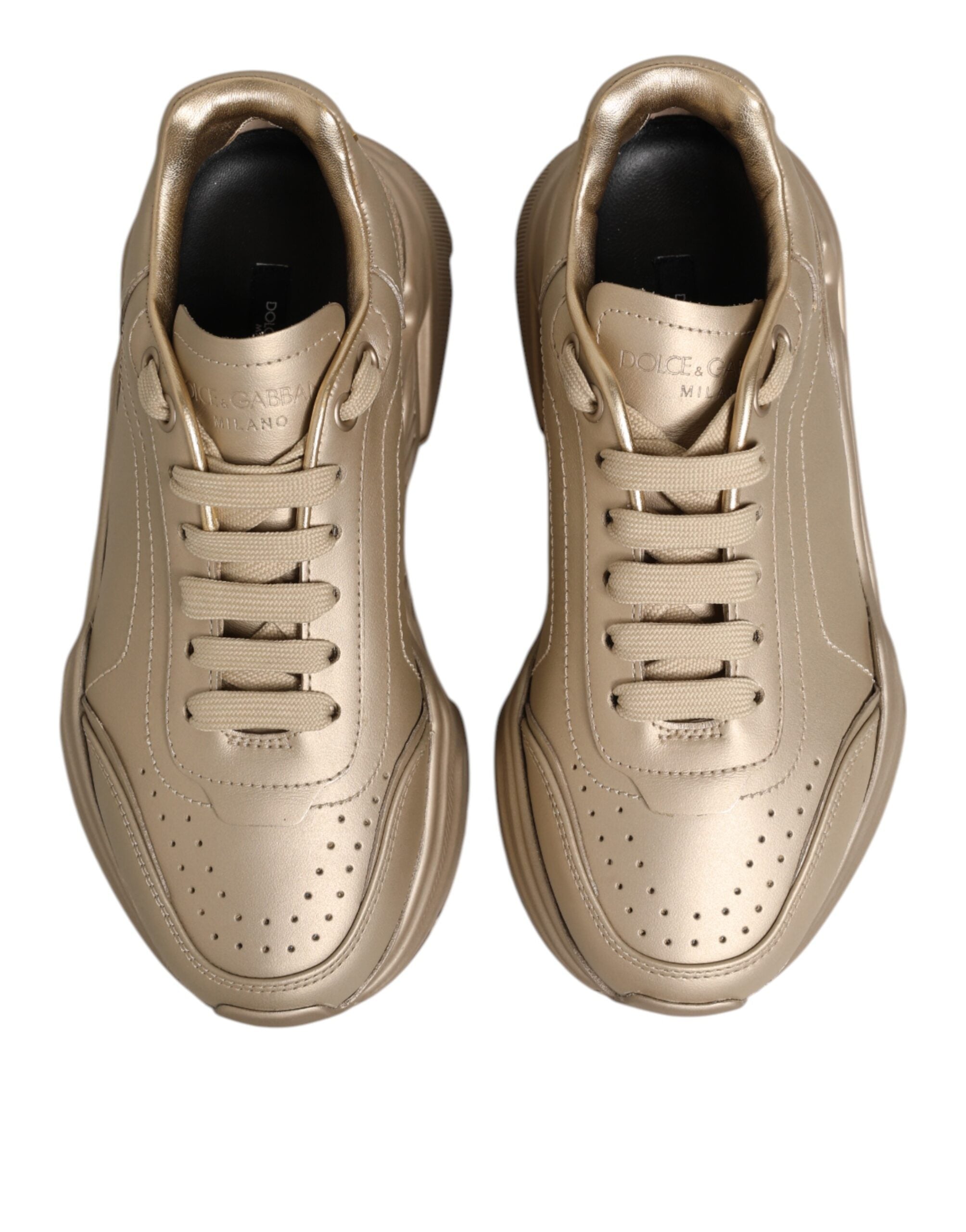 Front view of Dolce & Gabbana gold leather Daymaster sneakers by KILAUE
