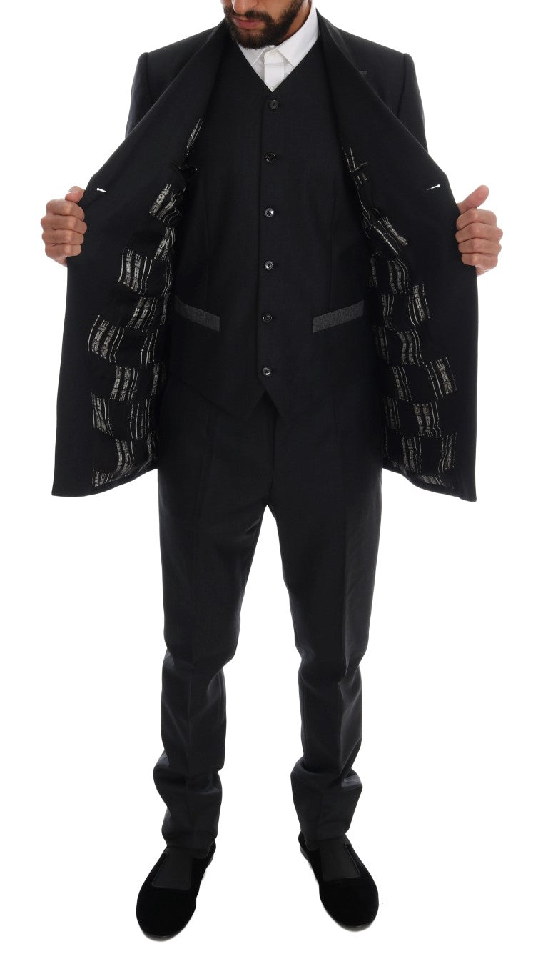 Model wearing Dolce & Gabbana gray virgin wool 3-piece suit by KILAUE
