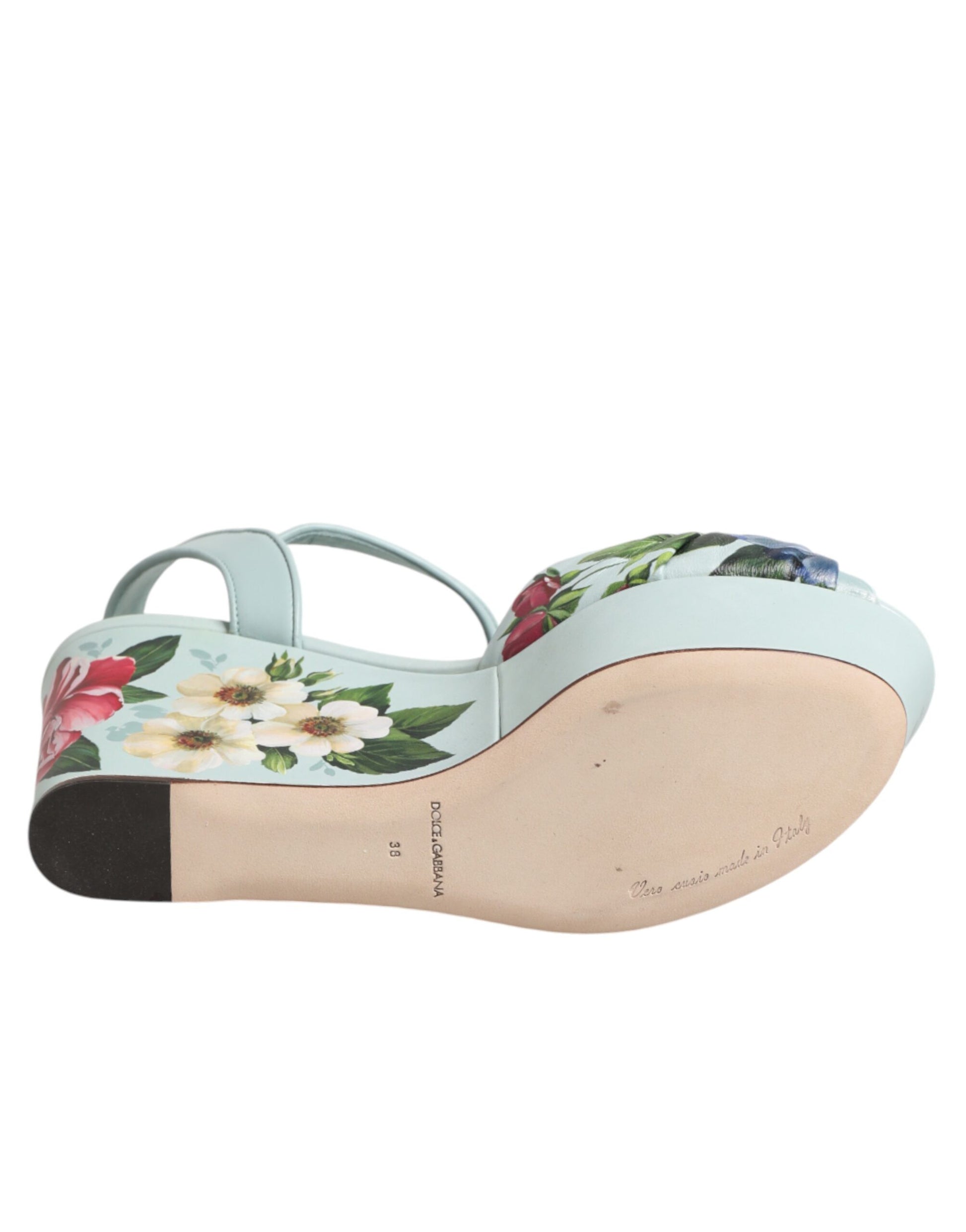 Close‑up detail of Dolce & Gabbana green floral ankle strap wedge sandals by KILAUE
