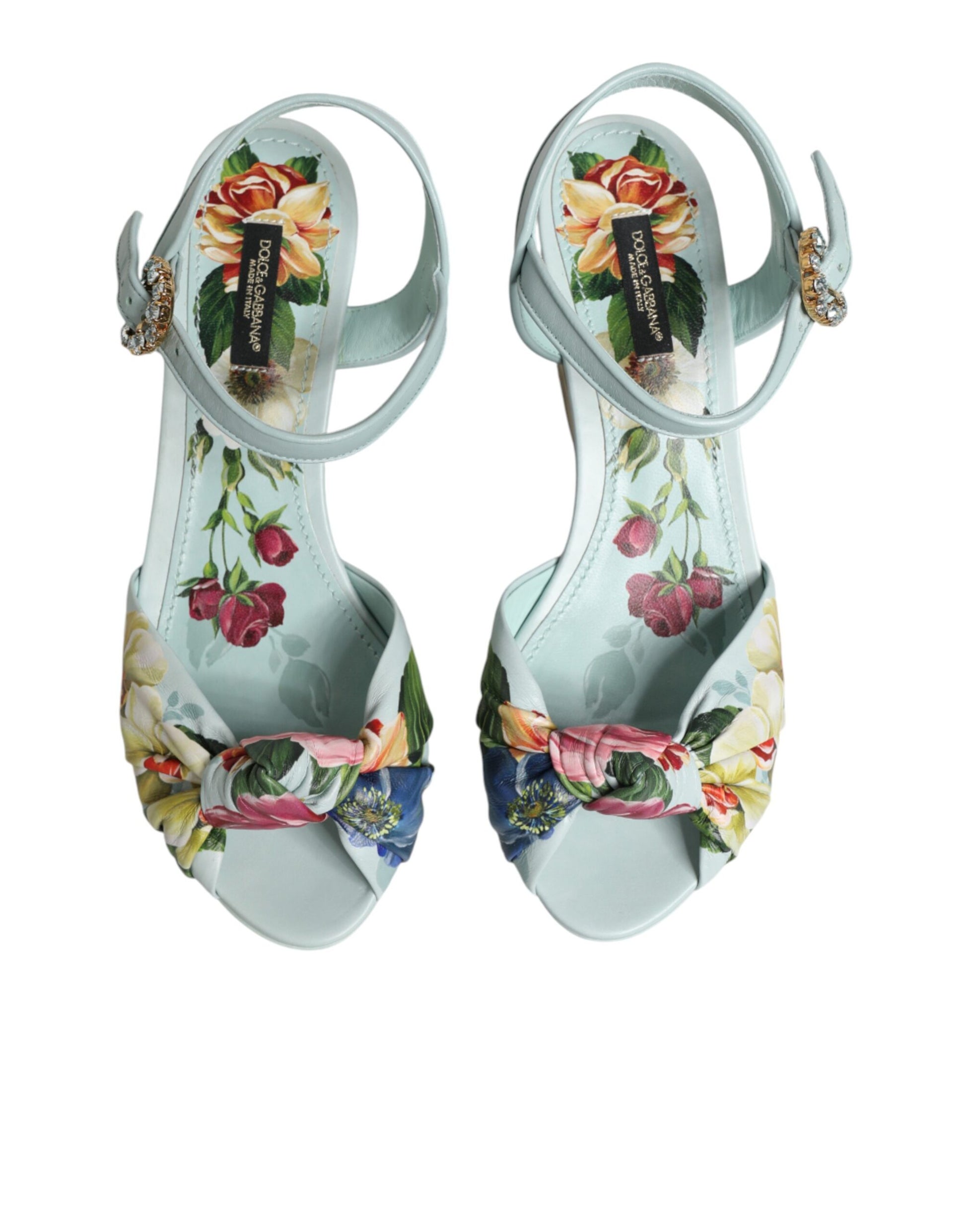 Side angle view of Dolce & Gabbana green floral ankle strap wedge sandals by KILAUE
