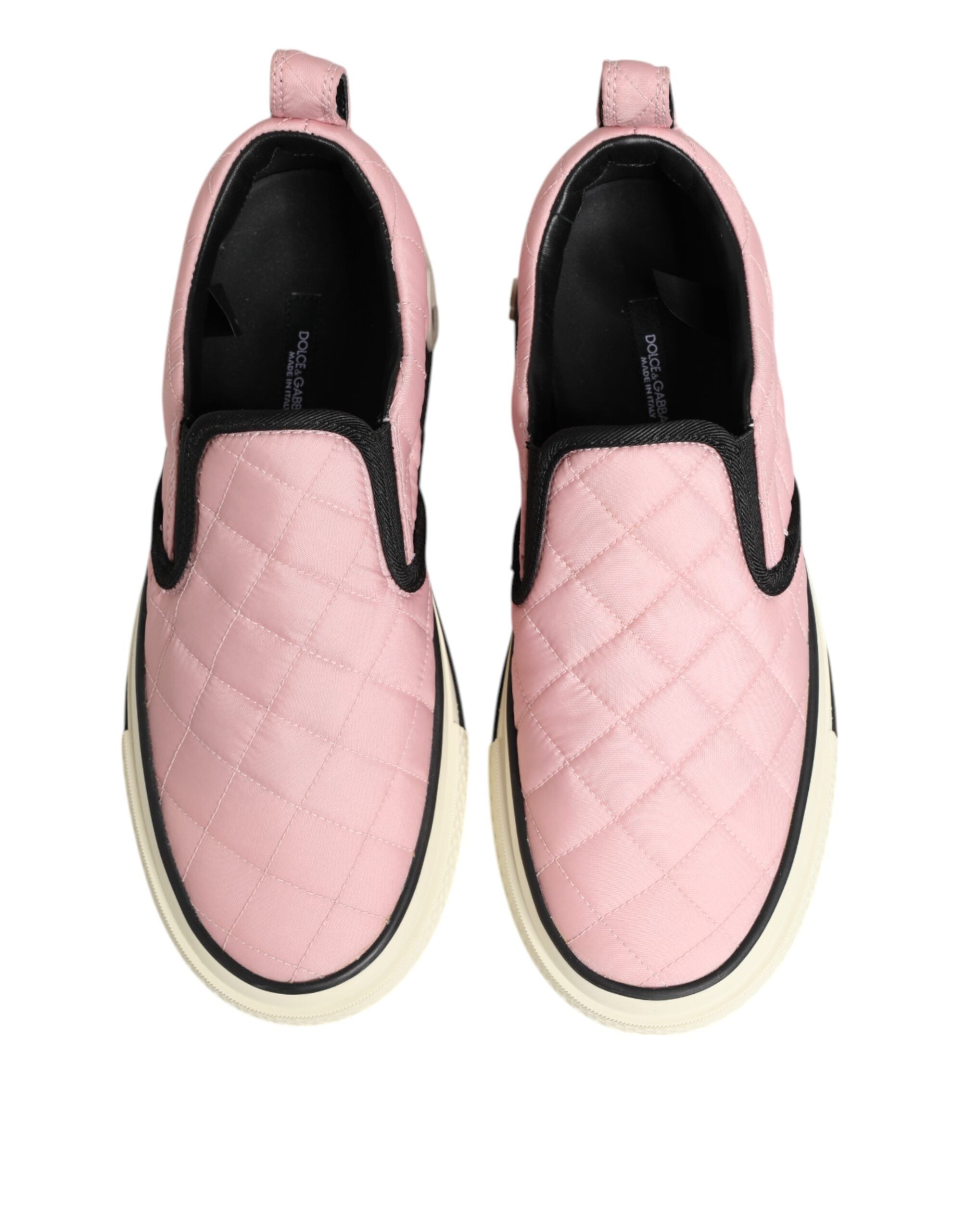 Model wearing Dolce & Gabbana pink quilted nylon slip-on sneakers by KILAUE
