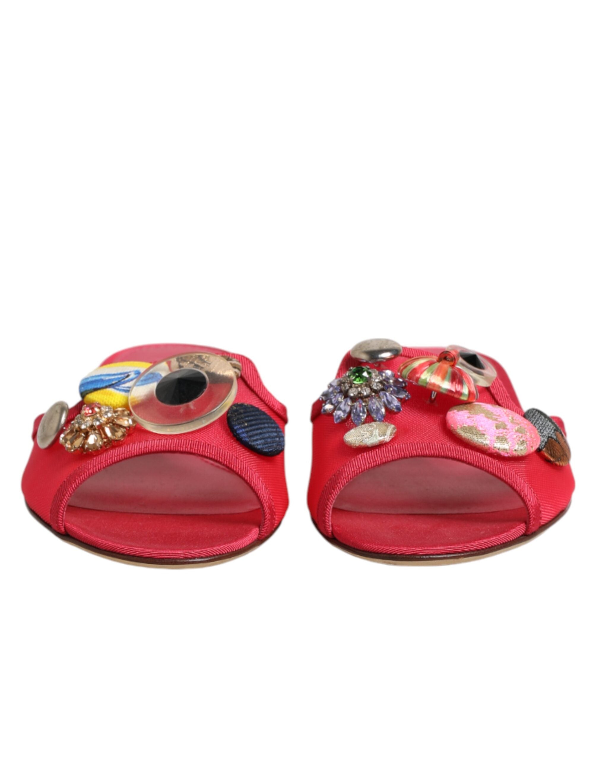 Front view of Dolce & Gabbana red embellished slip-on flats