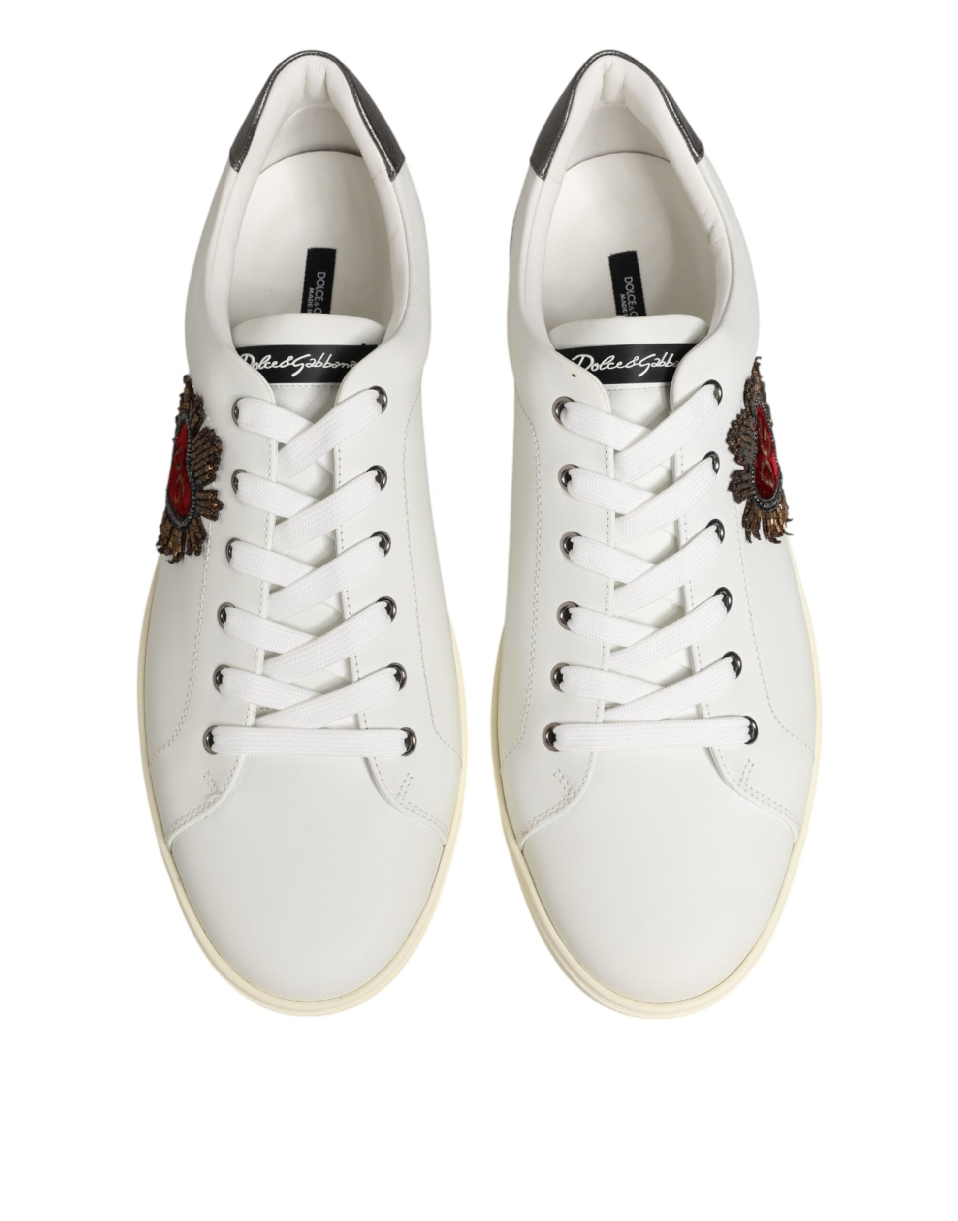 Front view of Dolce & Gabbana white leather heart embellished low-top sneakers by KILAUE
