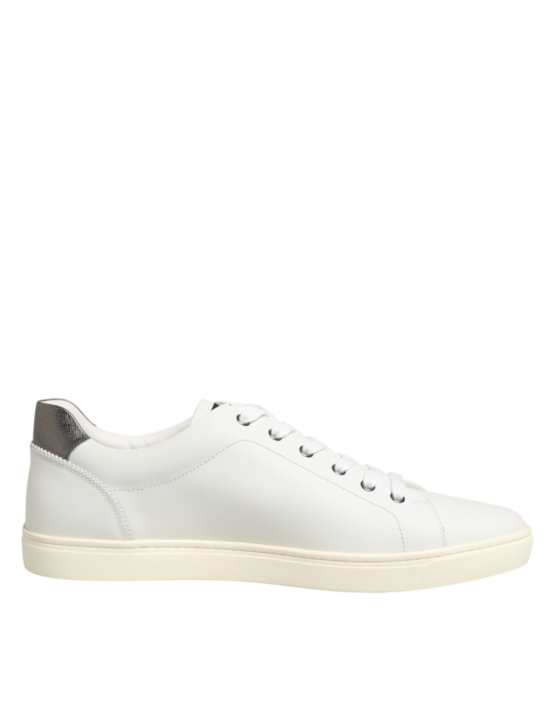 Model wearing Dolce & Gabbana white leather heart embellished low-top sneakers by KILAUE
