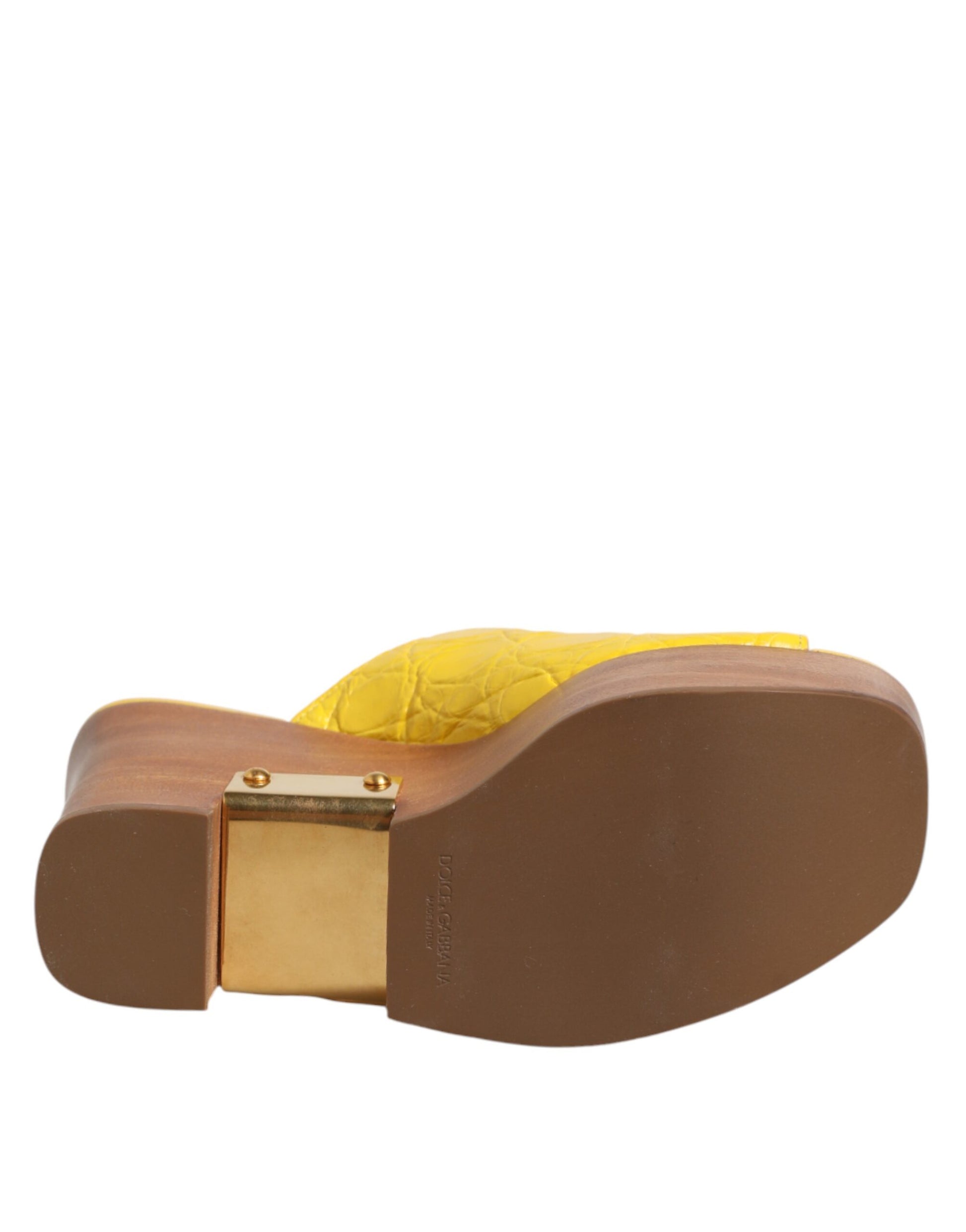 Close‑up detail of Dolce & Gabbana yellow leather wood wedge mules by KILAUE

