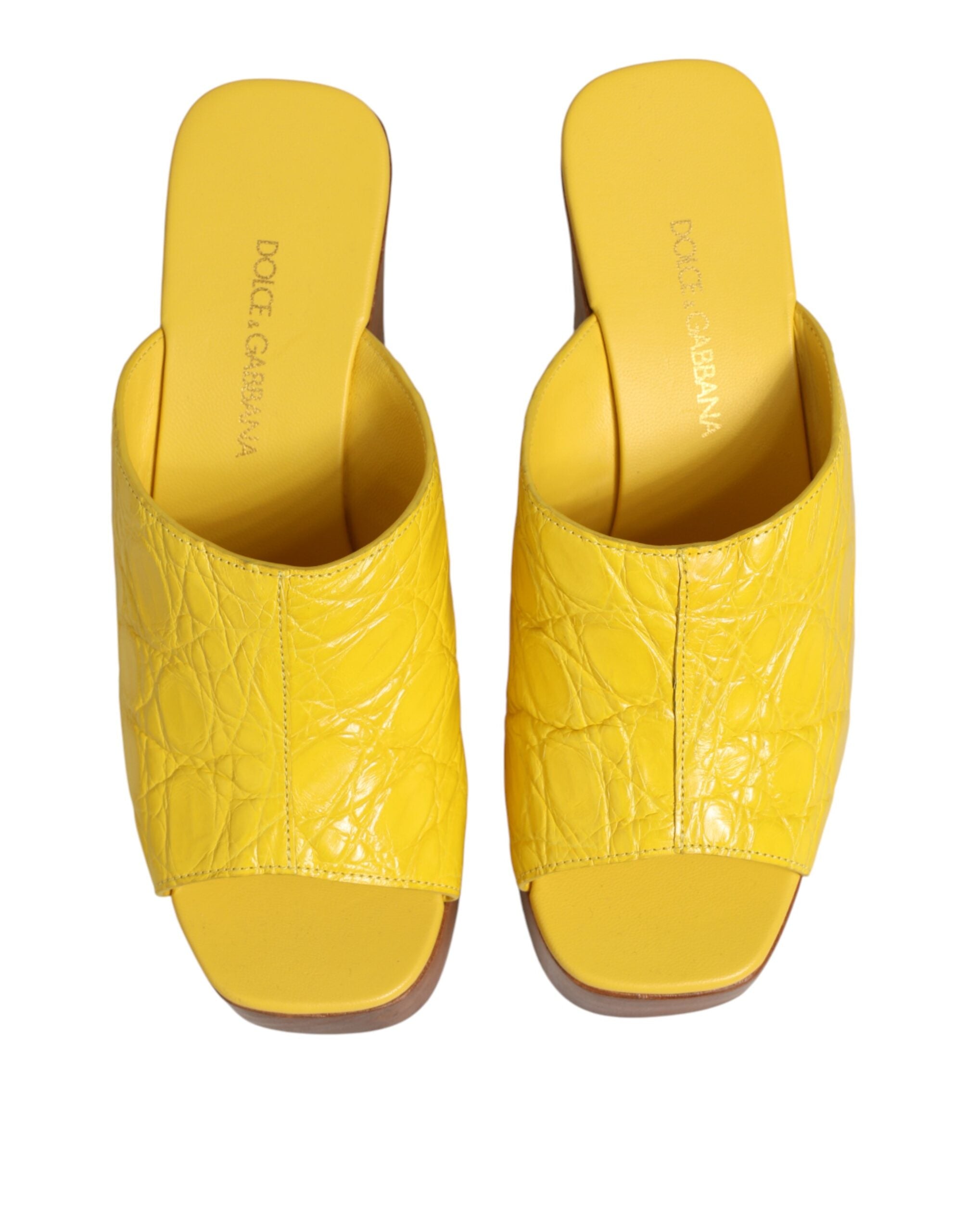 Front view of Dolce & Gabbana yellow leather wood wedge mules by KILAUE
