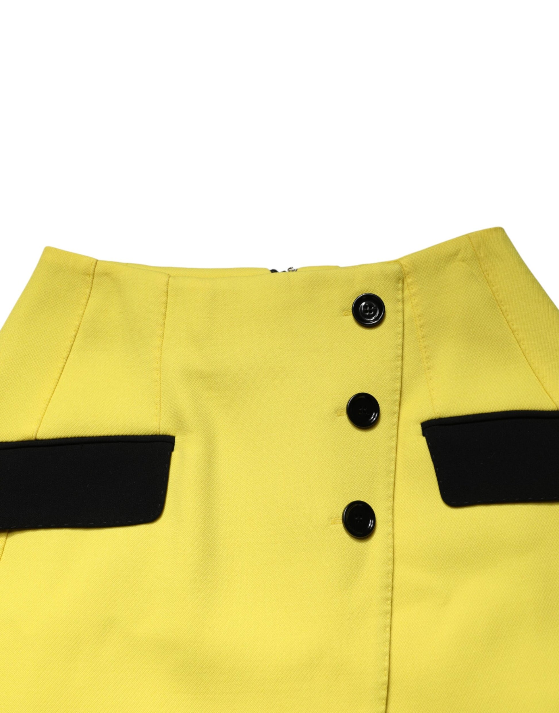 Model wearing Dolce & Gabbana yellow virgin wool mini skirt with button detail by KILAUE
