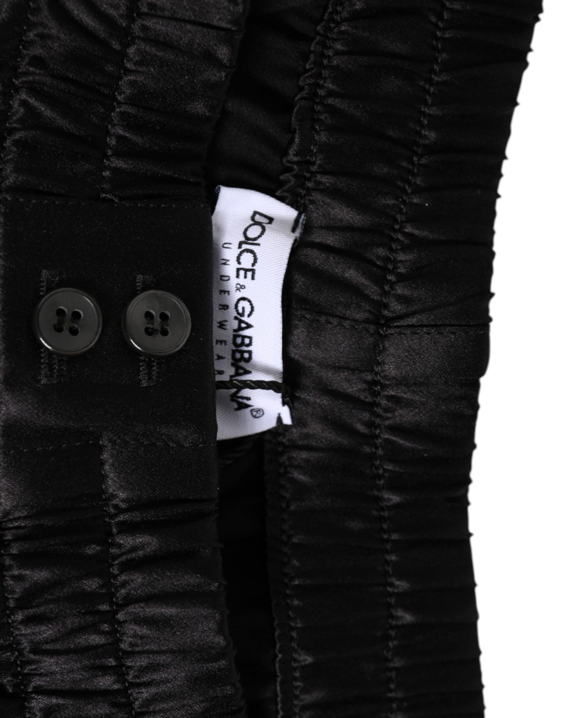 Kilaue Dolce & Gabbana black silk satin boxer shorts worn on model
