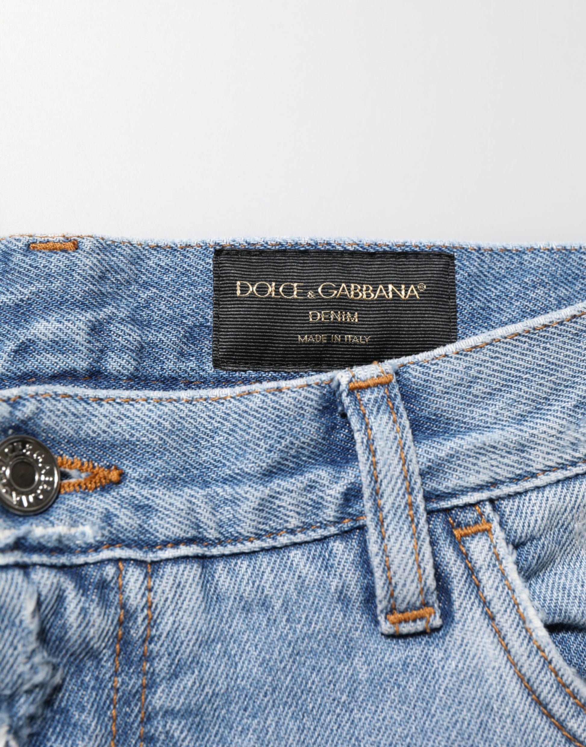Kilaue Dolce & Gabbana blue distressed slim fit jeans worn on model
