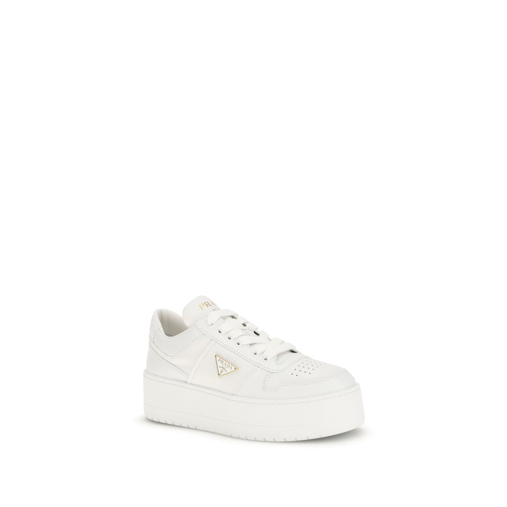 Front view of Prada white leather platform sneakers bold 1980s-inspired luxury trainers