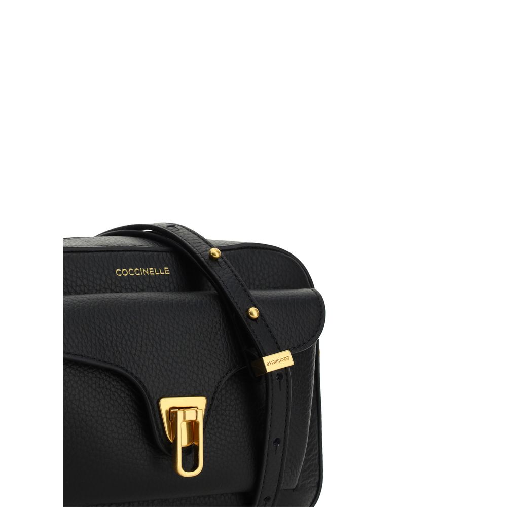 Stylish black leather shoulder bag with gold-tone accents
