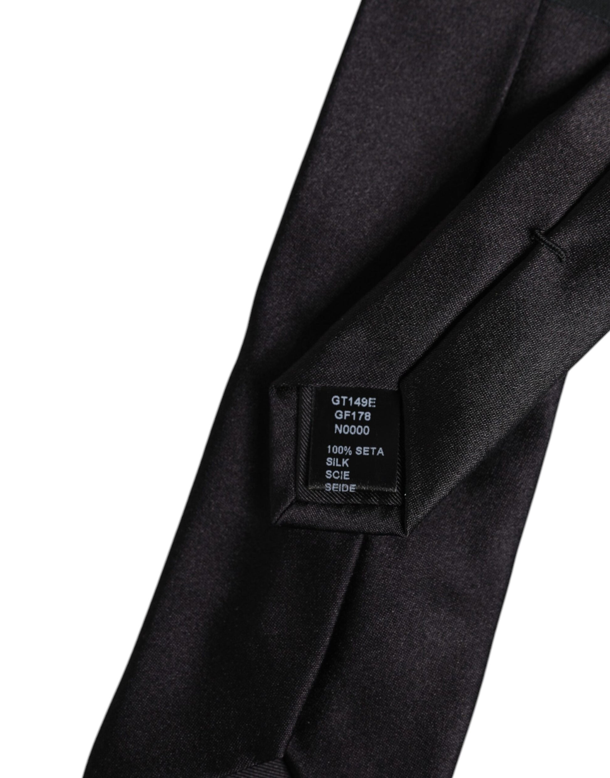 Elegant silk necktie with edgy safety pins