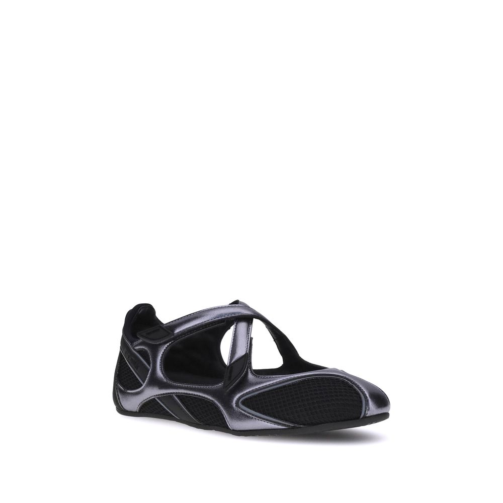 Side view of The Attico Black Nomad mesh ballet flats highlighting the crisscross strap detail